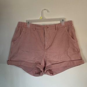 Light pink shorts.